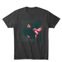 a black t - shirt with an image of a man in a circle